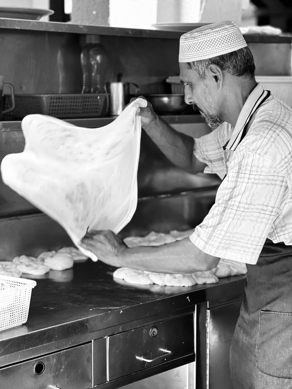 Roti Canai flaky Malaysian flatbread served with curry dipping sauce